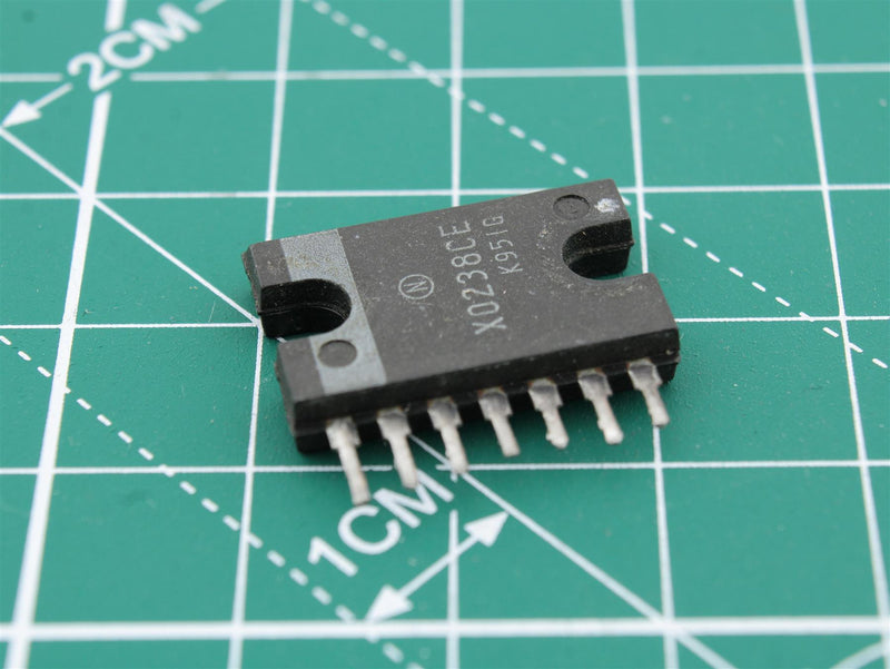 X0238CE Circuit intégré