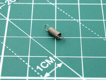 Pos.009 – XX641760 Head Base Spring for Cassette Deck